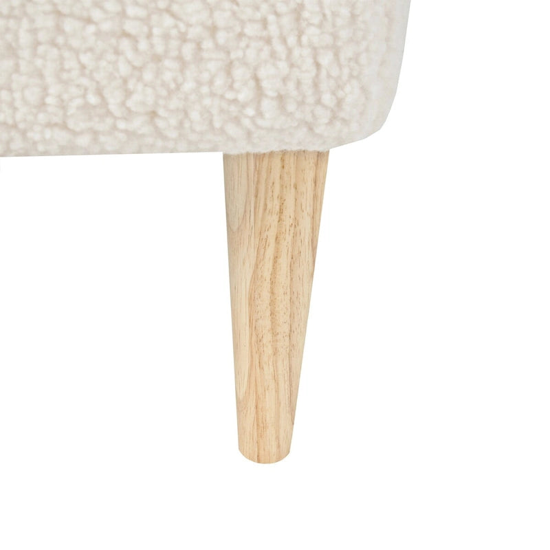 Tavolino poggiapiedi pouf imbottito in bouclé con gambe in legno